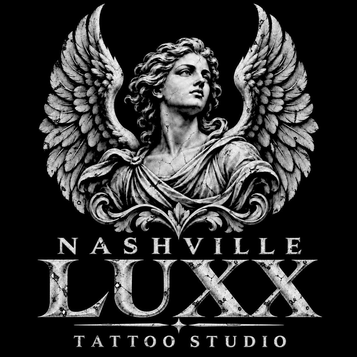 Nashville LUXX Tattoo Studio — cracked stone angel and lettering